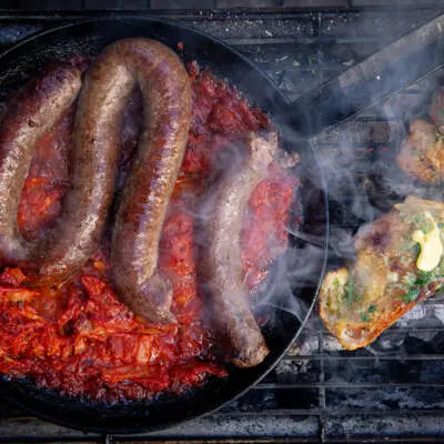 Boerewors in Harissa Smoor with Roasted Garlic butter Sourdough